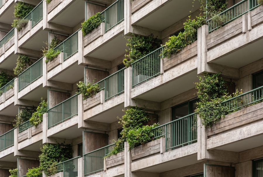 Facade detail with stacked balconies and planters